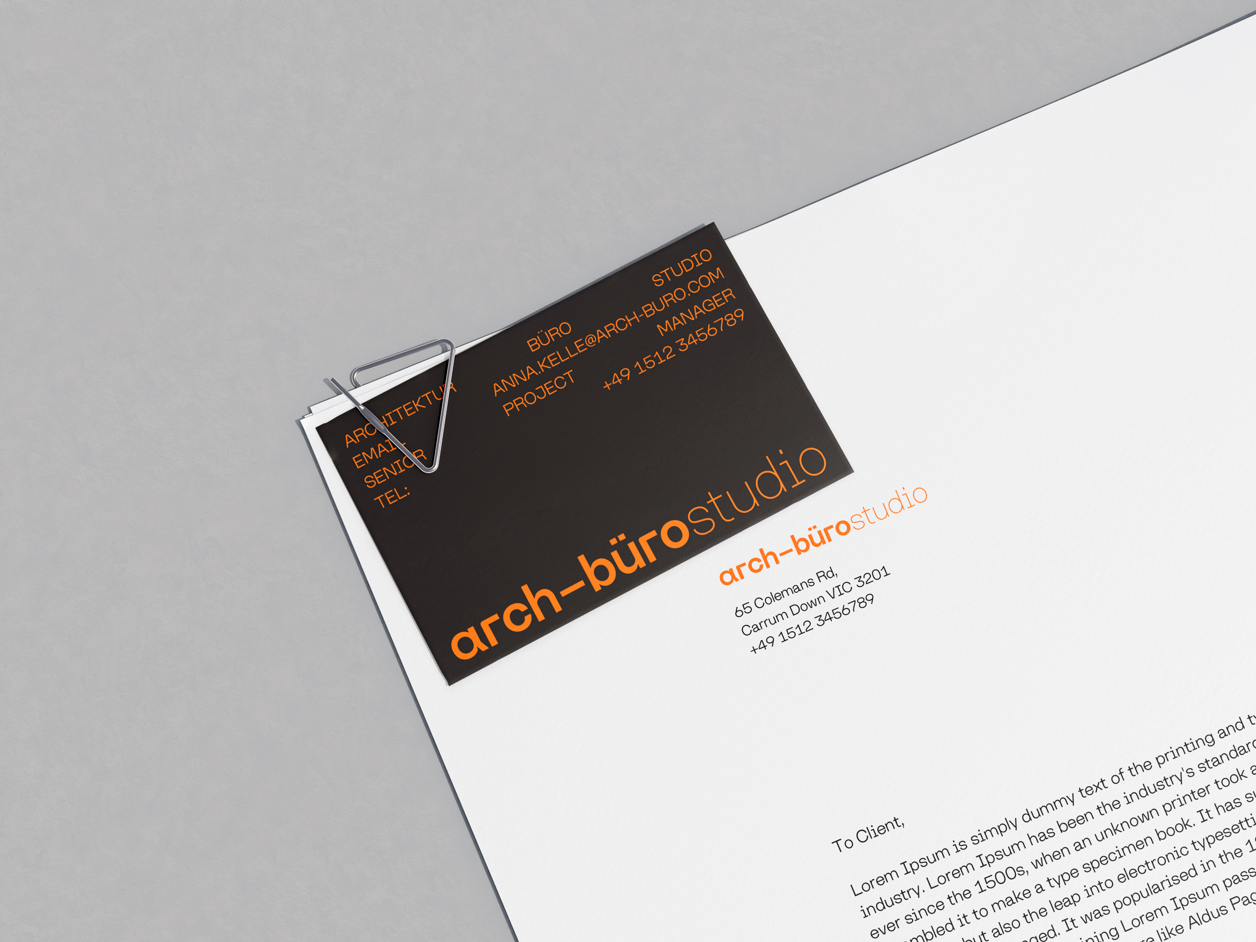 Graphic of a typography specimen showing the alphabet and numerals on top of a dark gray background.