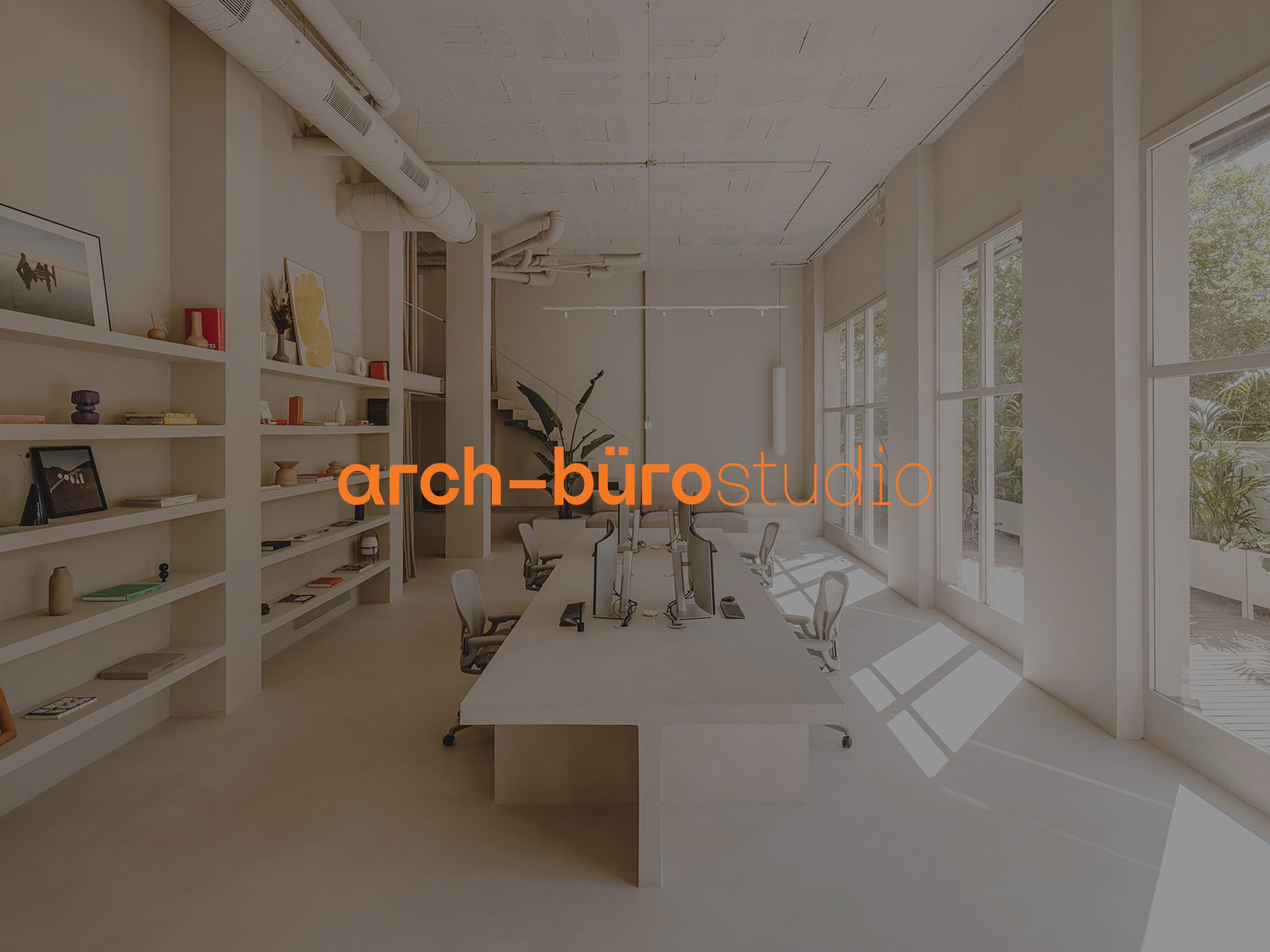 Stationery design of letterhead and business cards for the company Anders on top of a blurred photo of a house interior.